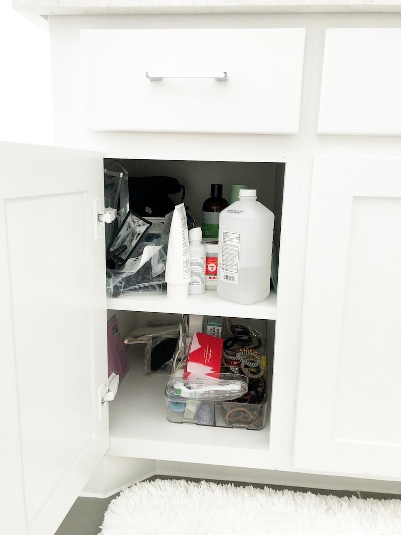 Bathroom cupboard messy