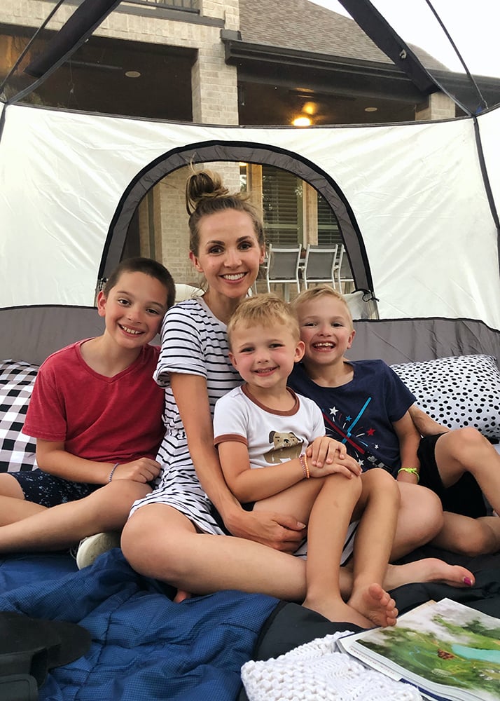 family camping in the yard