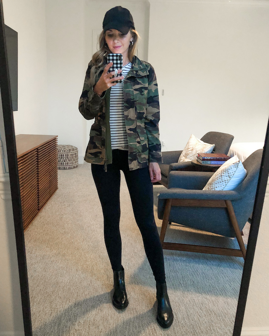 Black ankle boots with black leggings