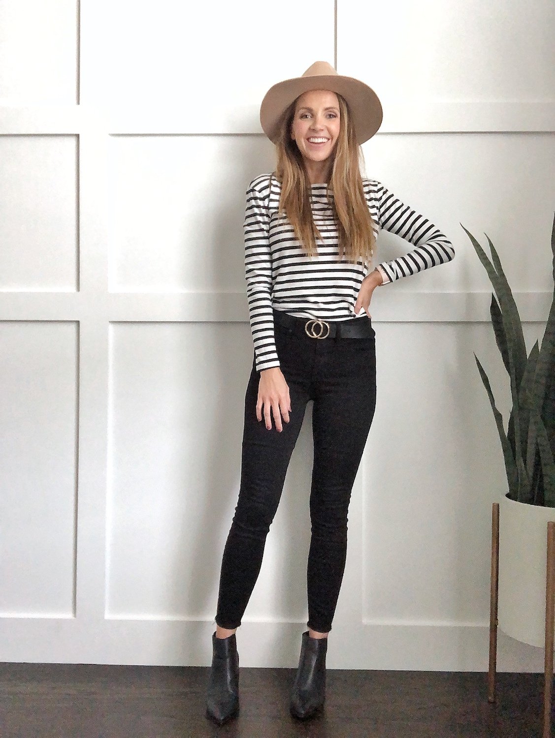 outfits with black booties: striped tee and black jeans