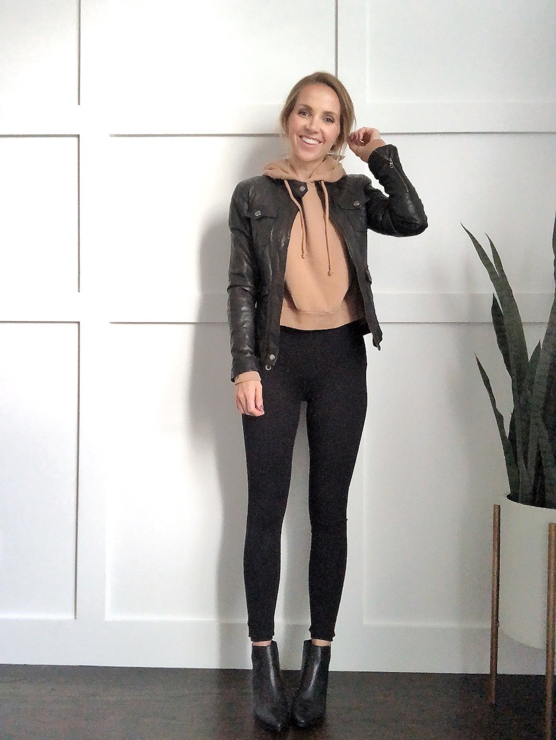 outfits with black booties: camel sweatshirt with leggings and leather jacket