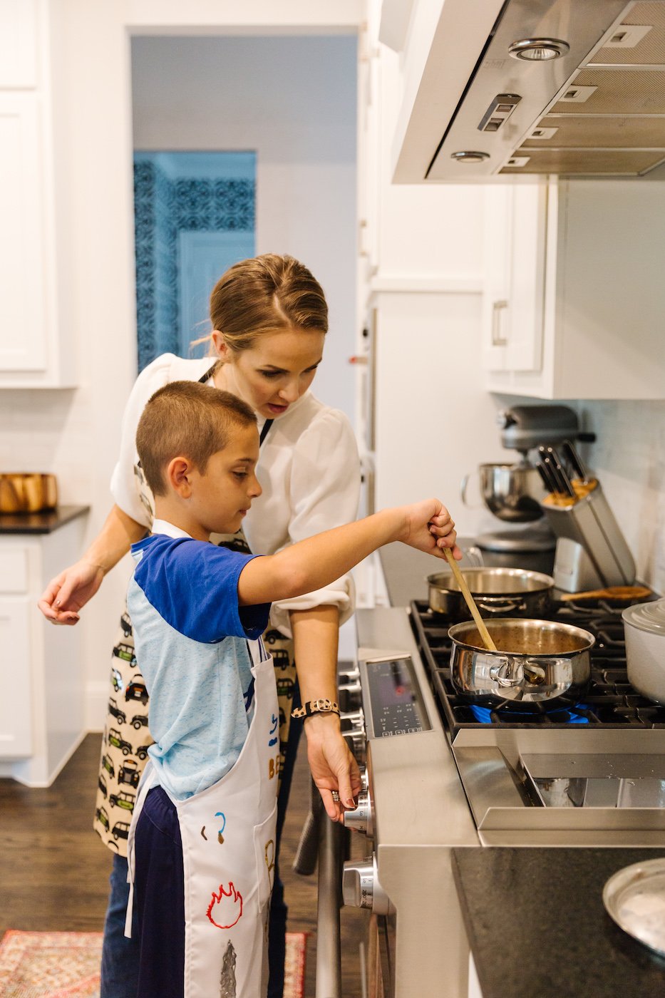 Cooking with Kids - mom and B in the kitchen at the stove