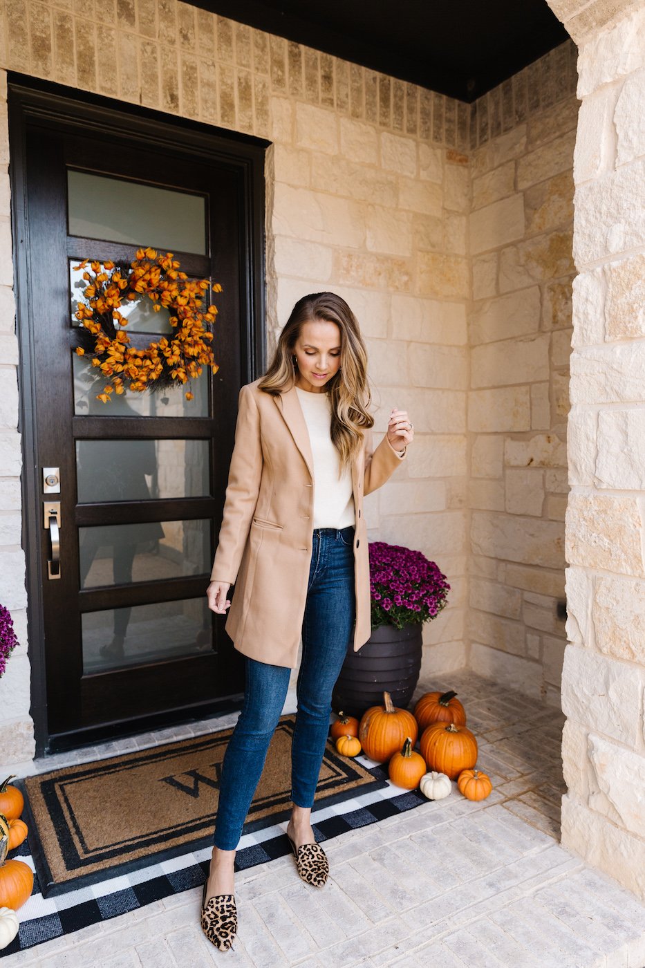 tan coat dark wash jeans leopard flats