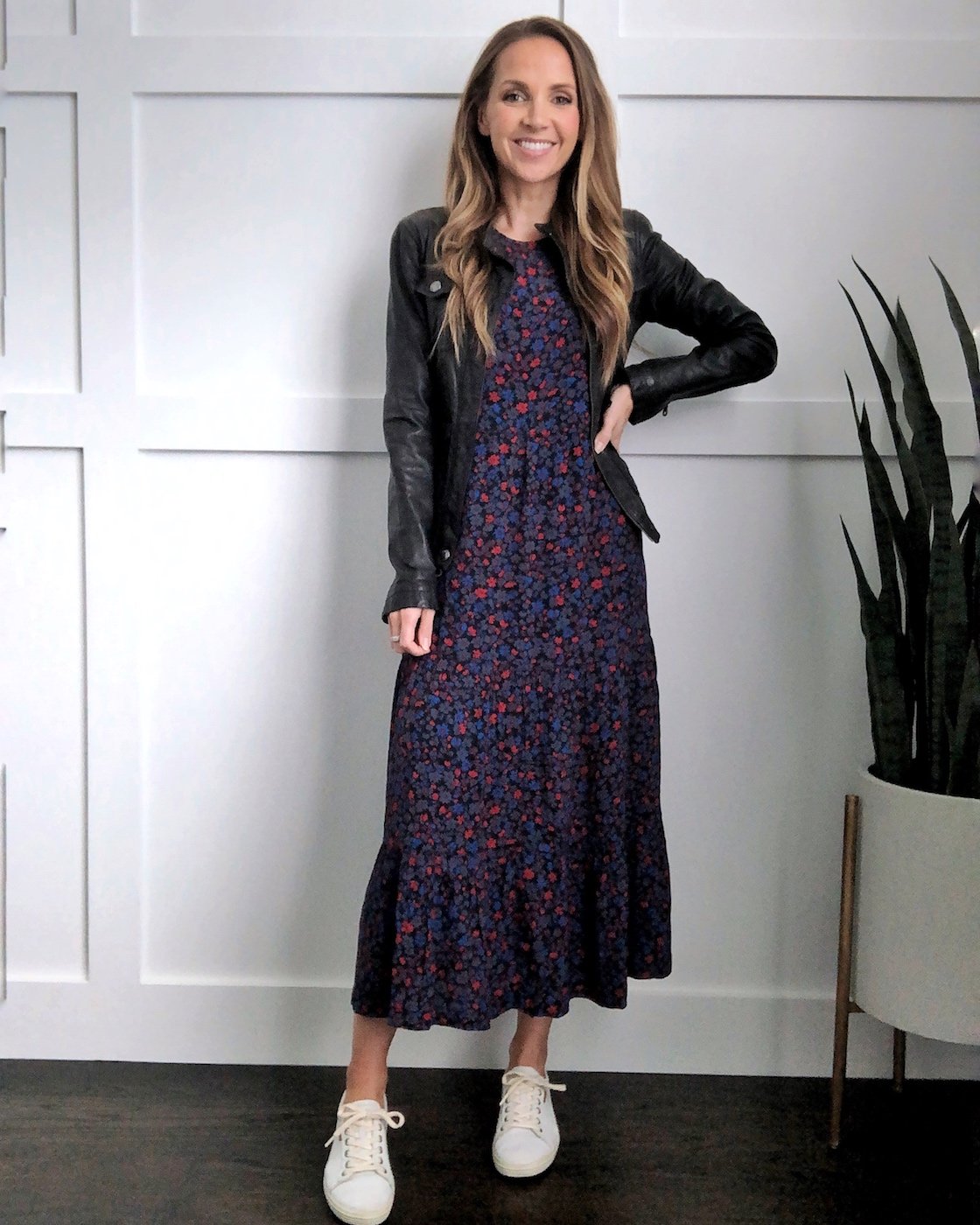 How to wear a midi dress with a leather jacket and sneakers