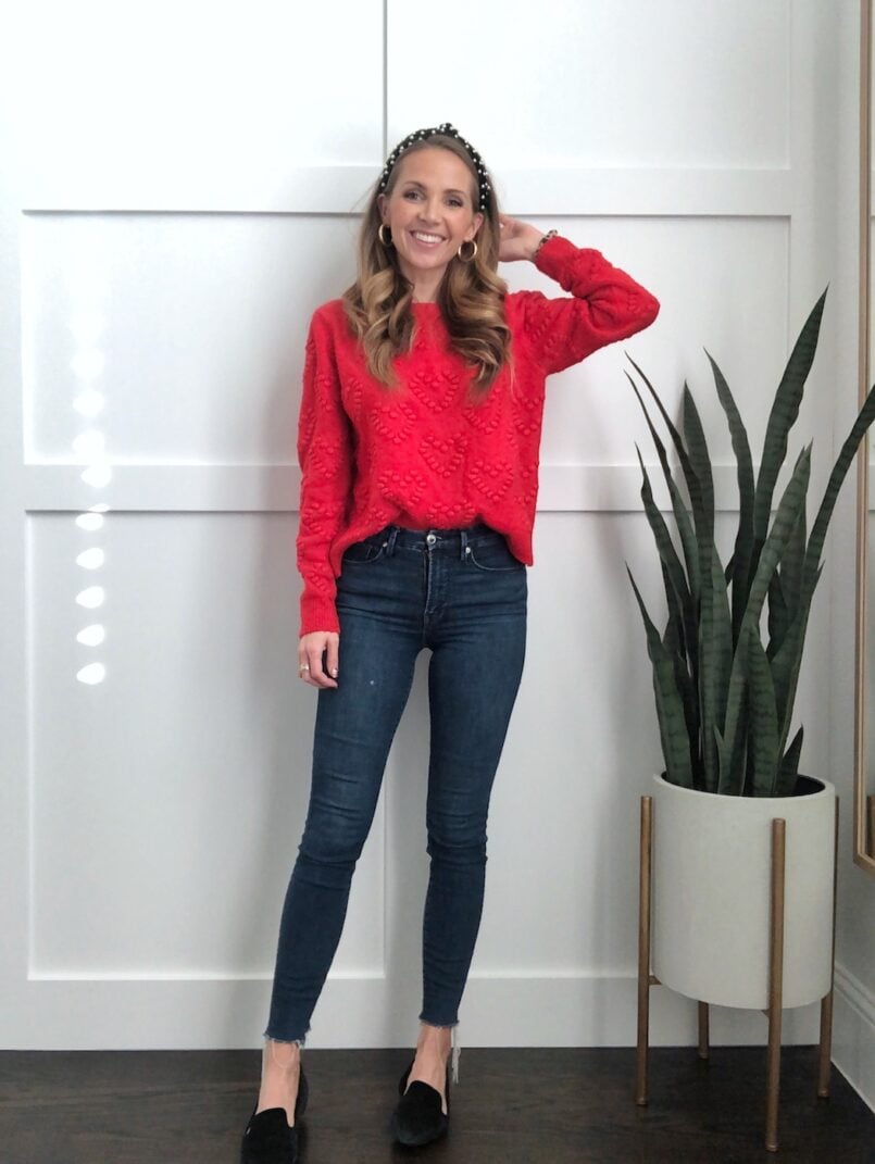 red sweater with pearl headband