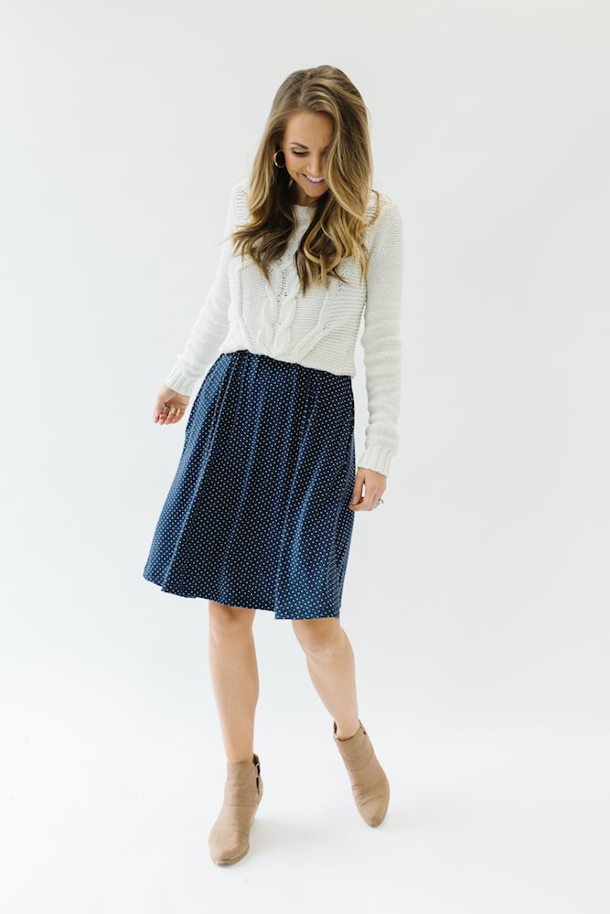 merrick white collection dress with sweater over the top