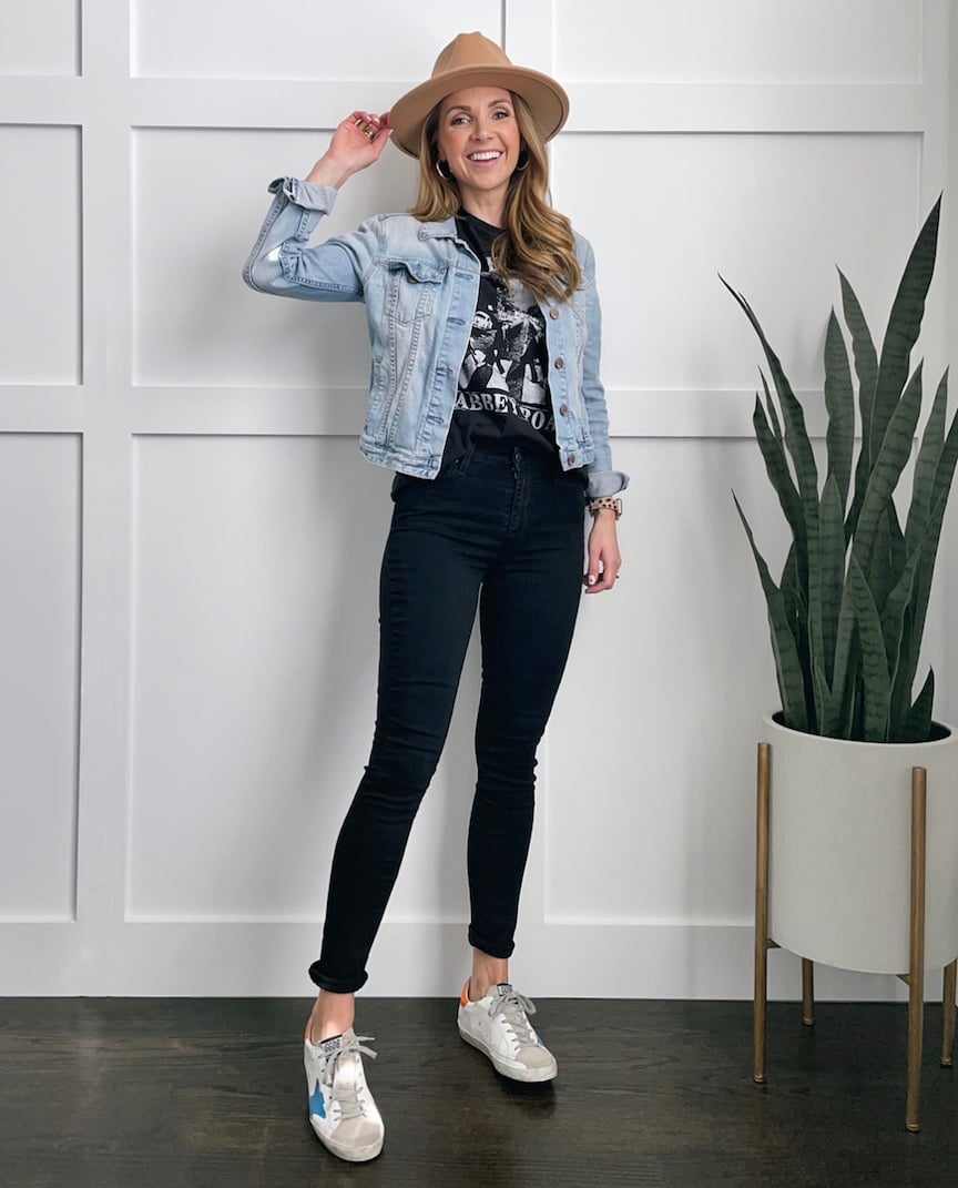 denim jacket with graphic tee and black jeans