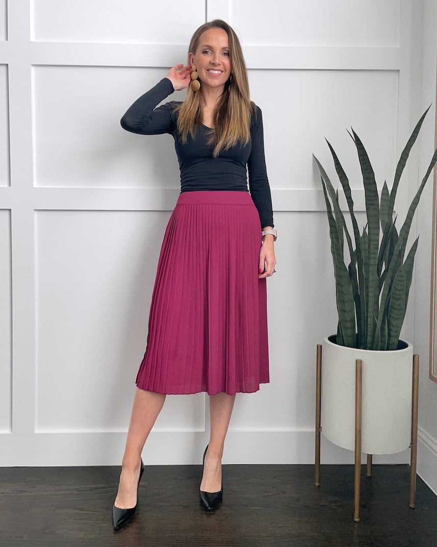 pink midi skirt with black bodysuit