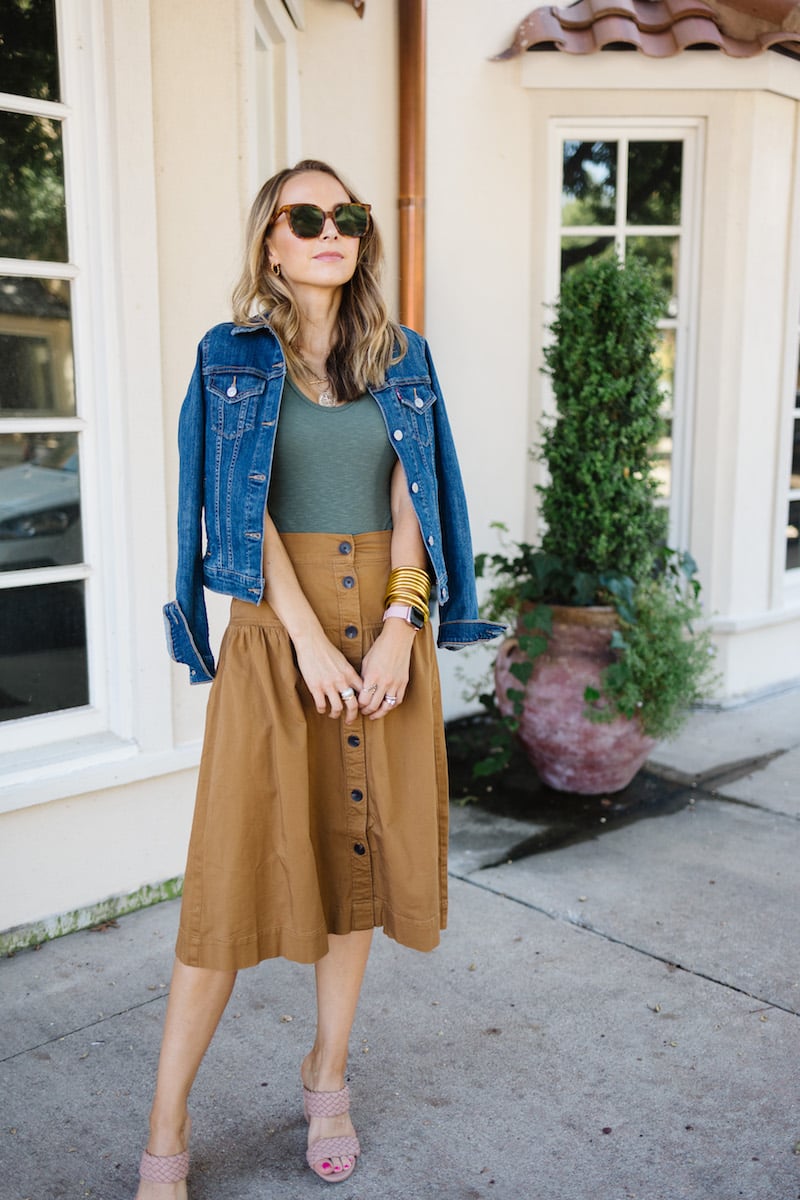 green bodysuit with brown skirt