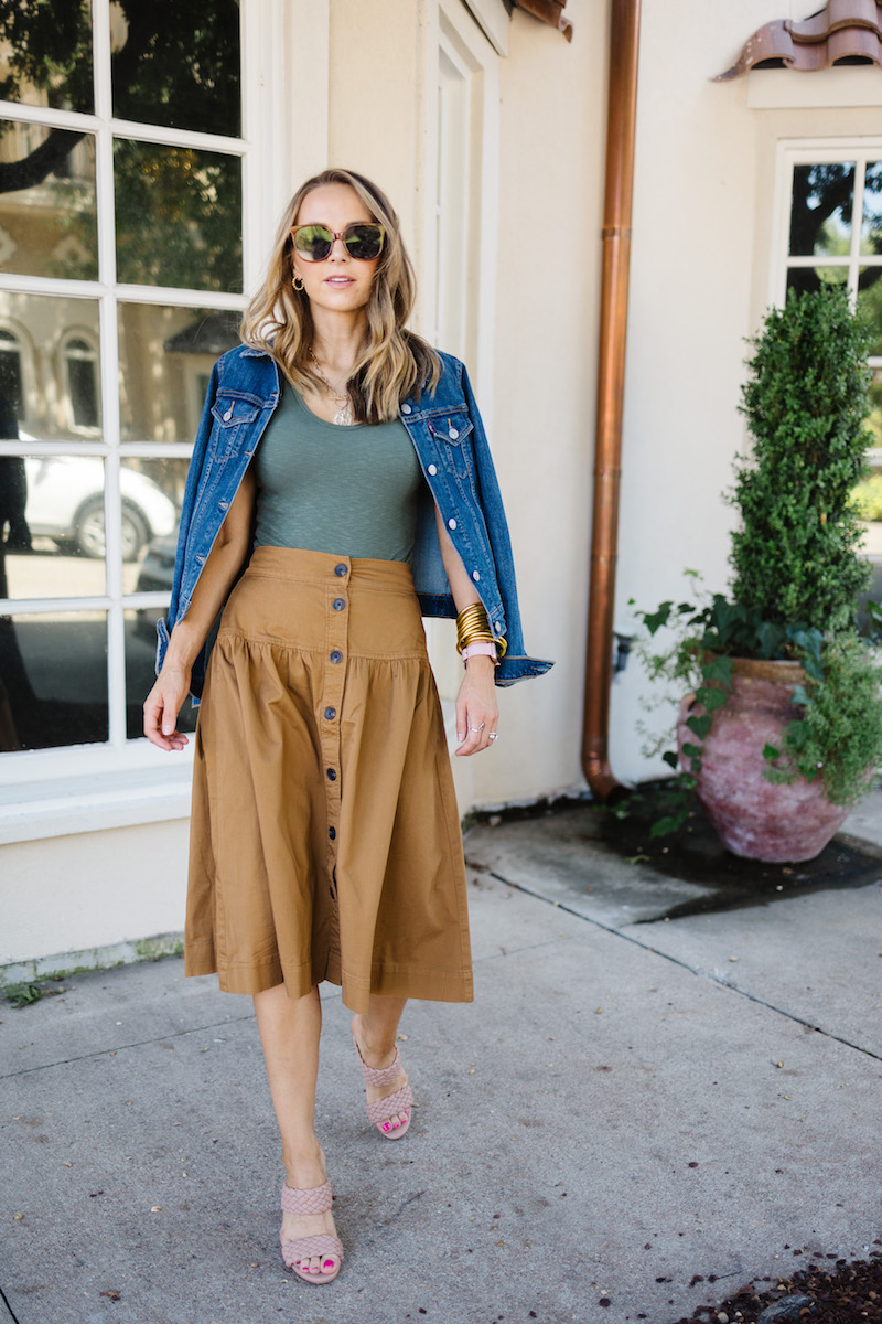 green bodysuit with brown skirt