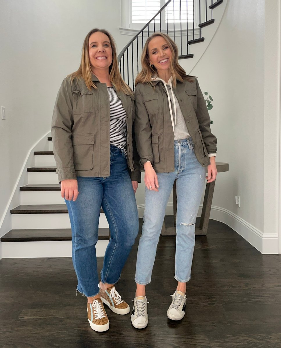 olive jacket and light wash jeans