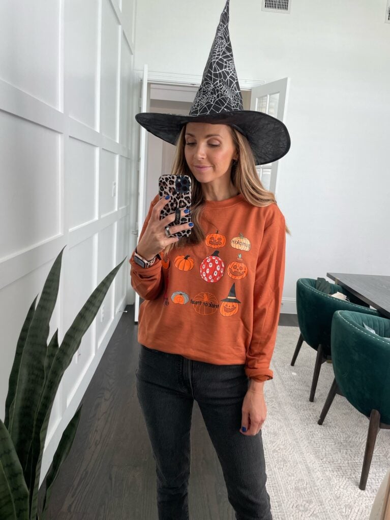 Halloween sweatshirt gray jeans witches hat