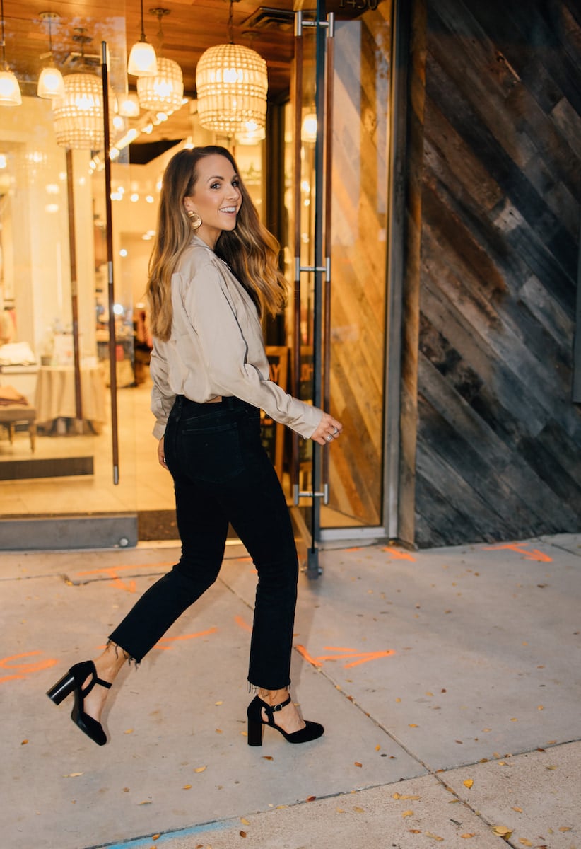 black straight leg jeans with champagne shirt