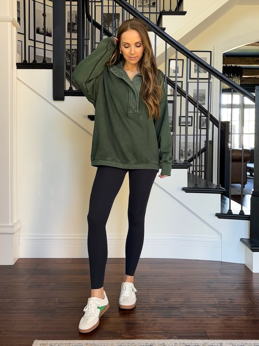 green aerie pullover with black leggings and walmart sneakers